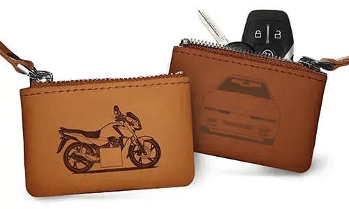 Two brown leather key pouches with zippers: one with motorcycle and plate 