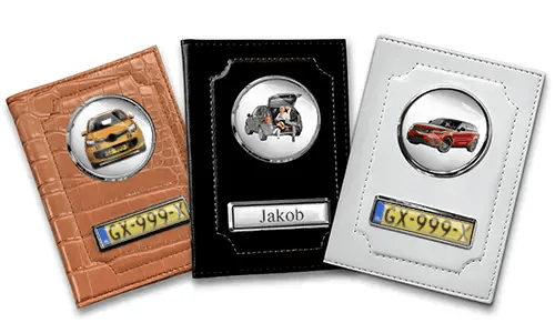Three personalized car document holders with custom designs