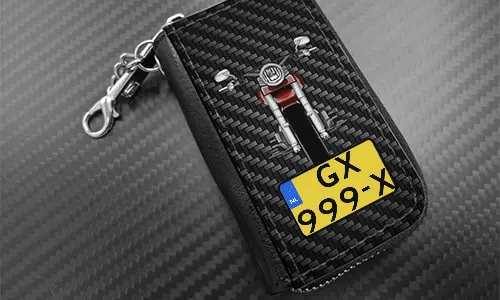 autoschlüssel cover mit Carbon Hintergrund und Motorradsilouette autoschlüssel cover