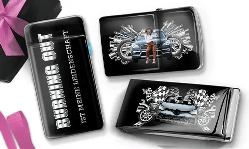 Three black wallets with car-themed designs. One has 