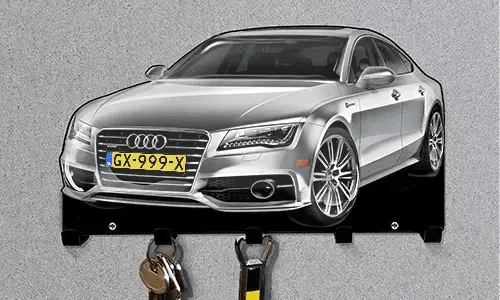Silver Audi-shaped wall key holder with five hooks for organizing keys