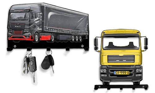 Two truck-shaped key holders: black-red semi-truck with trailer and three hooks, yellow truck with four hooks