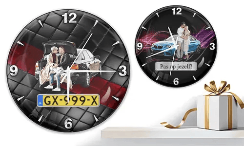 Two wall clocks with family and car scenes: left with trunk picnic on quilted background, right with blue sports car and couple over purple wave