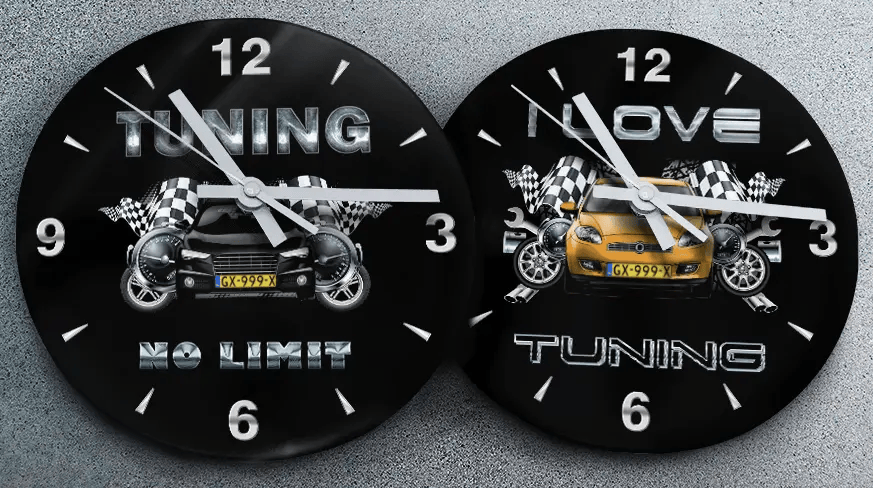 Two racing-themed wall clocks: left with black car and TUNING NO LIMIT text, right with blue car and MOVE TUNING text