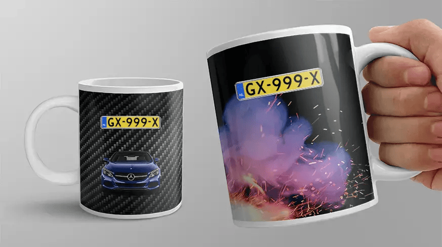 Two white mugs with car-themed designs: blue Mercedes on carbon background, silver BMW with sparks and smoke